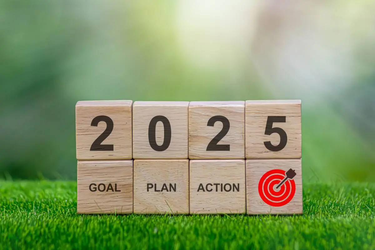 blocks spelling our 2025 supported by goal, plan, action, and a bullseye block