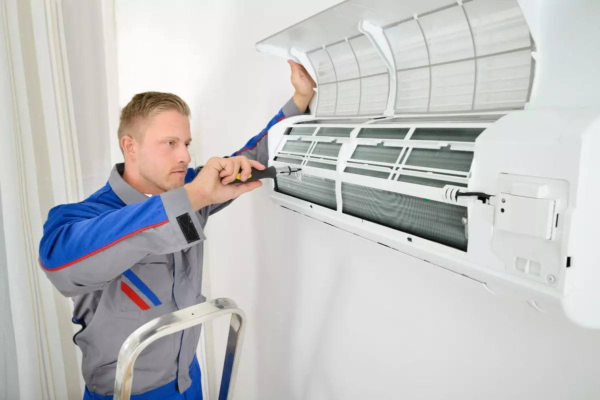 Professional repairing HVAC unit