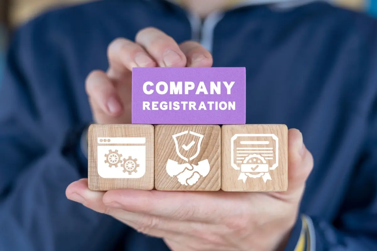 Hands holding blocks featuring the words Company Registration.