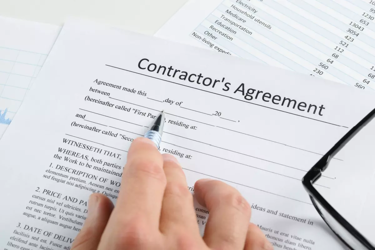 Close up on contractor agreement paperwork