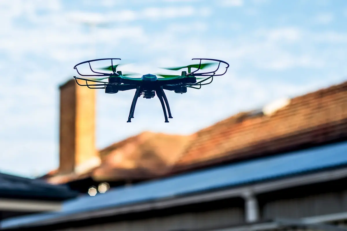 Drone inspecting a roof