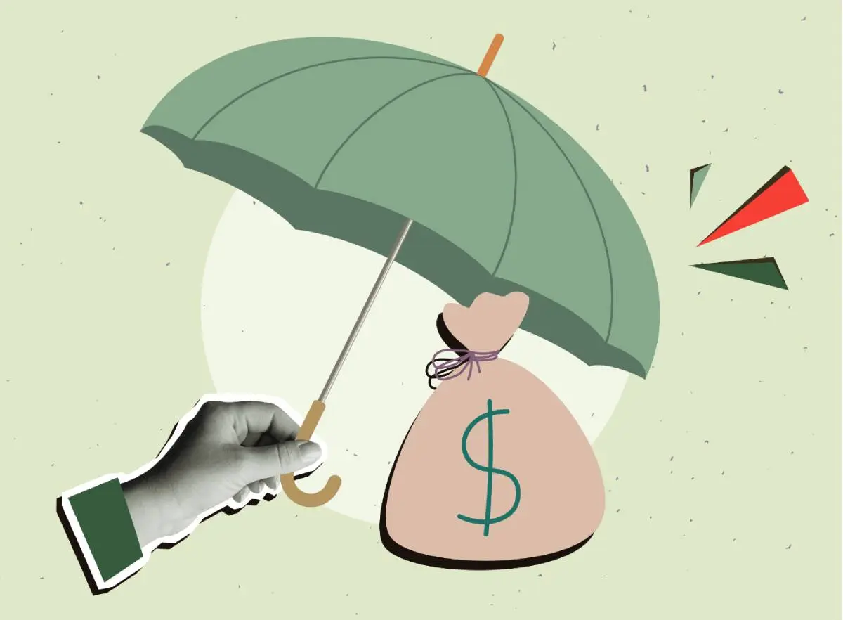 a hand holding an umbrella over a bag of cash after getting coverage from HVAC insurance companies