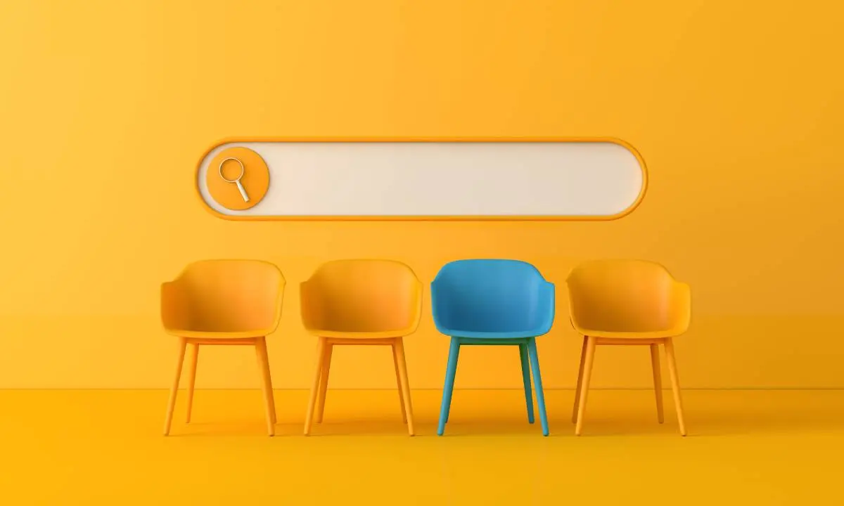 orange internet browser search bar in an orange room with orange chairs and one blue chair symbolizing the perfect HVAC hire