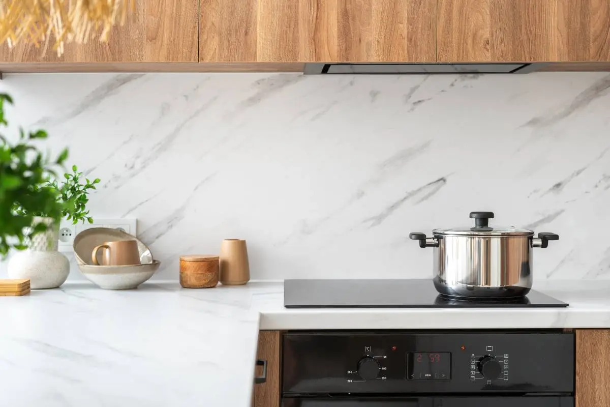 an induction stovetop on a marble countertop