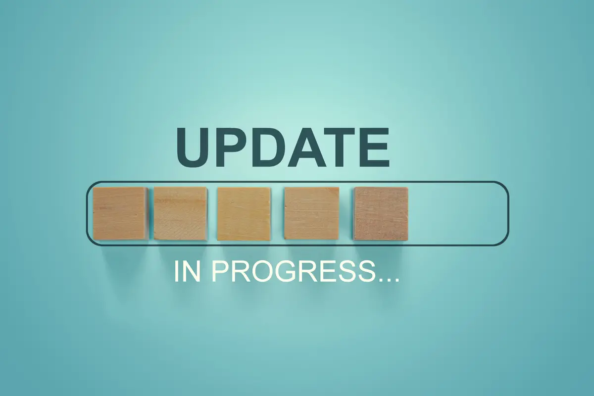 An update icon with the word "updating"
