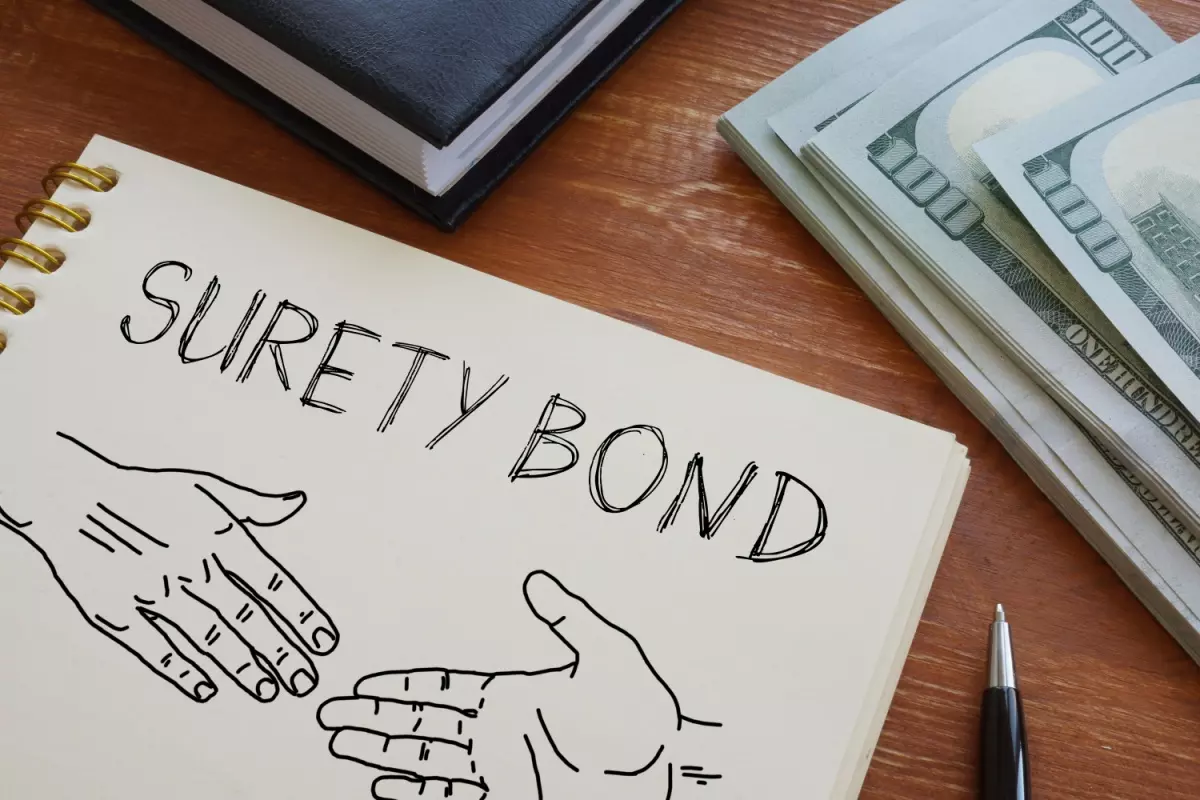 Notebook with depiction of surety bond