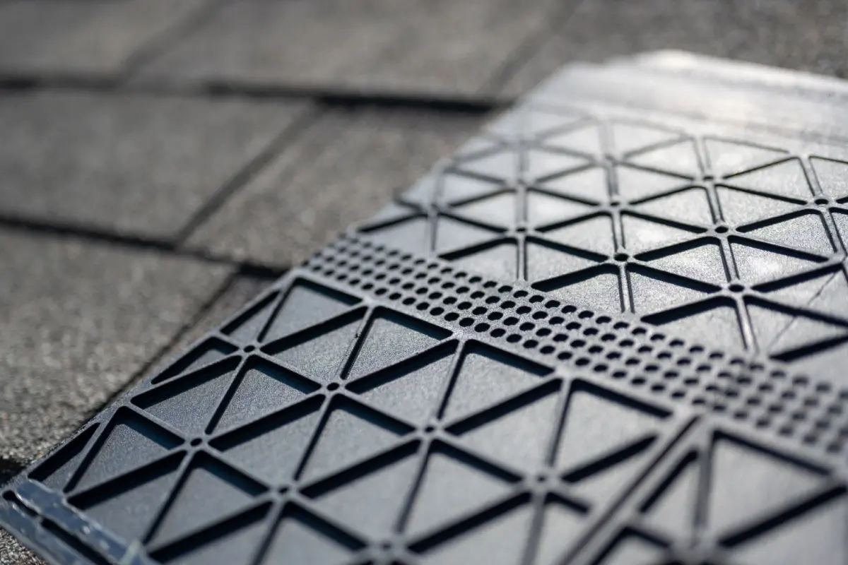 Underside of synthetic roof shingle